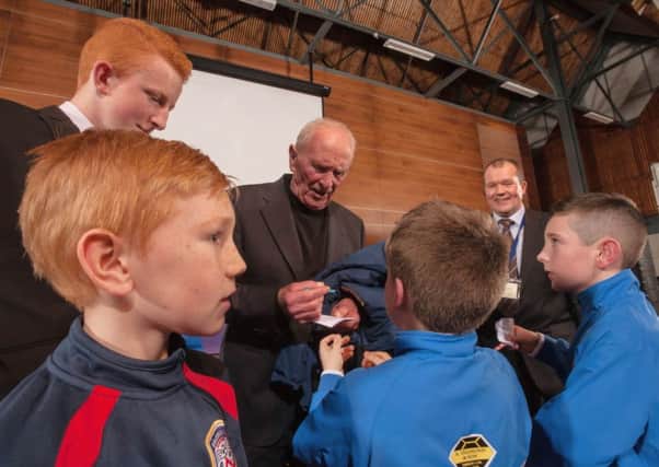 Harry Gregg besieged by young admirers at the lunch of the Harry Gregg Foundation in Ulster University Coleraine.    photo:Derek Simpson