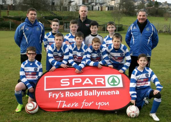 The Northend United Youth U-12 team pictured in their new strip sponsored by the Fry's Road Spar. Included is Eamon McKillop (Frys Road Spar), and coaches David Wylie and Boyd Black. INBT07-247AC