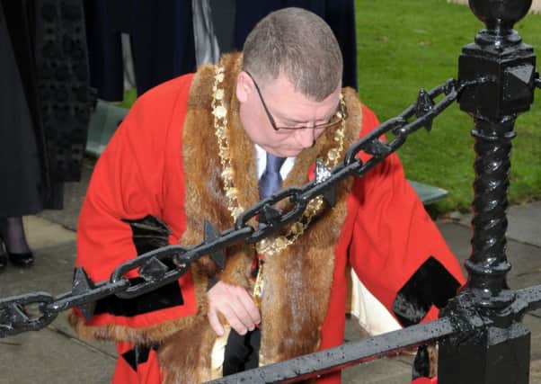 Larne Mayor Councillor Martin Wilson pictured wearing his ceremonial robe on Remembrance Sunday.