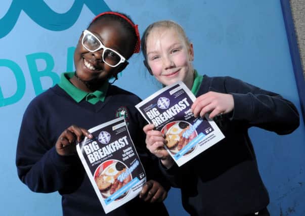 Holy Trinity Primary School pupils Janina and Caitlyn helping promote the Fr Rocks GFC Big Breakfast to be held at Paddy Cullen Park on Sunday the 1st of March from 10.00am.INMM0815-324