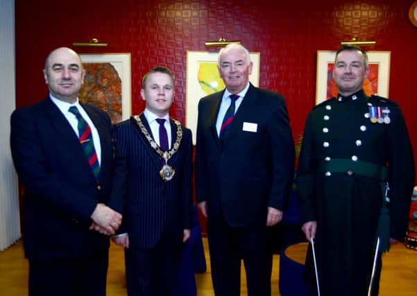David Forsey, Newtownabbey Mayor Thomas Hogg, Dr Norman Walker and WO1 Band Master Richard Douglas at the RIR Band concert in aid of ABF The Soldiers' Charity. INNT 08-132-GR