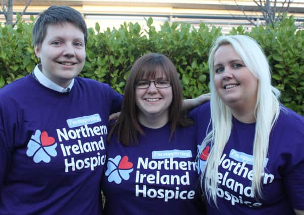 Elaine Anderson (centre) and her colleagues Sarah Brunston (left) and Francesca Whaley (right) gear up to support the 2015 Northern Ireland Hospice Walk.