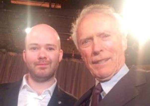 Glengormley film director Michael Lennox (left) enjoyed a chat with Hollywood legend Clint Eastwood during the Oscar nominees lunch at the Beverly Hilton.