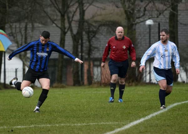 BBOB striker Joe McCready lines up a shot at goal during Saturday's match against Claudy Rovers. INLS0915-136KM