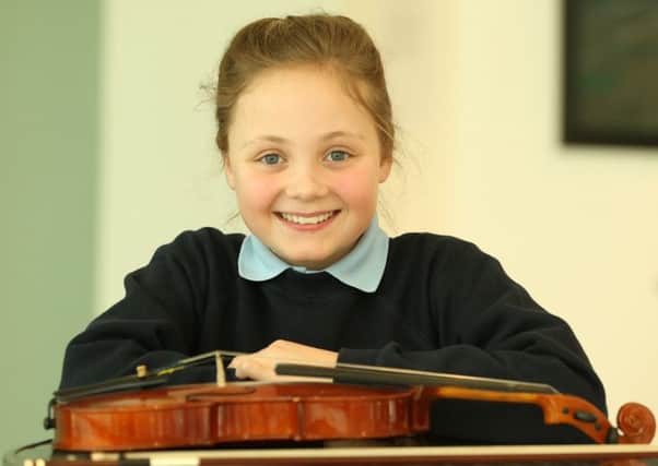 Phoebie McIlroy of Carnaghts PS who competed in the Under 11 violin solo at the Ballymena Music Festival. INBT 10-103JC