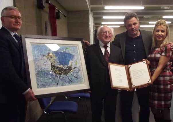 Cookstown singer and artist Jim McKee and his partner, Emma Heatherington, an author from Donaghmore, pictured with Irish President Michael D Higgins and Oliver Murphy (left), President of the Institute of Technology, Tralee.