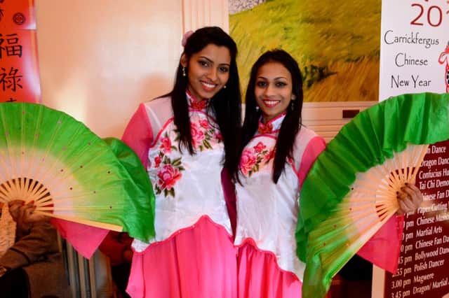 Kousalyaa Somasundram and Daliya Khadir at the Chinese New Year celebrations at Carrick Town Hall. INCT 08-114-GR