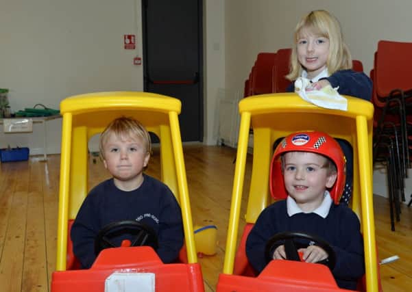 Harry, James and Olivia have fun at Gleno Pre-school. INLT 05-032-PSB