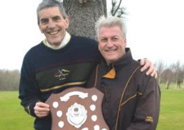 Doubles winners Philip Patterson and Michael McDonald with the Matchplay Shield.