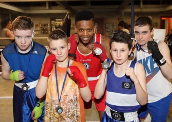 Lisburn Boxing Club members Michael Agnew, Ben Lancaster, Mosa Kambule, Ryan Roy and Declan Moore who took part in the recent County Antrim boxing championships. US1509-501cd  Picture: Cliff Donaldson
