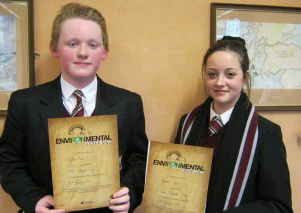 Ulidia students Niambh Ogle and Callum Blunt with their certificates.  INCT 09-741-CON