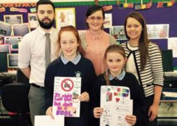 Kennedy's Pharmacy Primary School Poster Competition. Carrowreagh Primary School winners 1st Lucy and  2nd Katie. INBM11-15 Carrowreagh Primary School