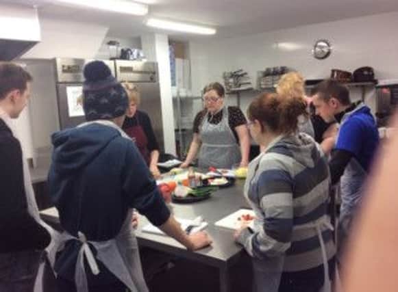 Young people picking up cookery skills at the YMCA Health Hub. INCT 09-751-CON HUB