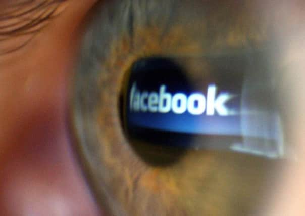 Embargoed to 0001 Monday July 12
File photo dated 08/03/09 of the Facebook logo reflected in a person's eye. Young Facebook users will be able to report suspicious online behaviour and access internet safety advice with the launch of a new application today. PRESS ASSOCIATION Photo. Issue date: Monday July 12 2010. All users of the social networking site will be able to access an advice centre from their homepage where there will be a dedicated facility for reporting suspected grooming or inappropriate sexual behaviour.The facility is the result of a joint initiative between Facebook and the Child Exploitation and Online Protection (CEOP) Centre and users will be able to bookmark the ClickCEOP service or add it as an application to find information about online safety. See PA story CRIME CEOP. Photo credit should read: Dominic Lipinski/PA Wire