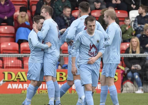 Institute's Robbie Hume celebrates after scoring their equaliser at Crusaders. Picture by Stephen Hamilton/Presseye