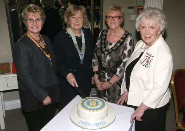 Janet Howard, District Chairman of Inner Wheel, along with Patricia Perry (Ballymena President), Mayor of Ballymena, Cllr. Audrey Wales, and Lord Lt. of County Antrim Joan Christie, cut a special cake to mark the 70th anniversary of Ballymena Inner Wheel. INBT11-250AC