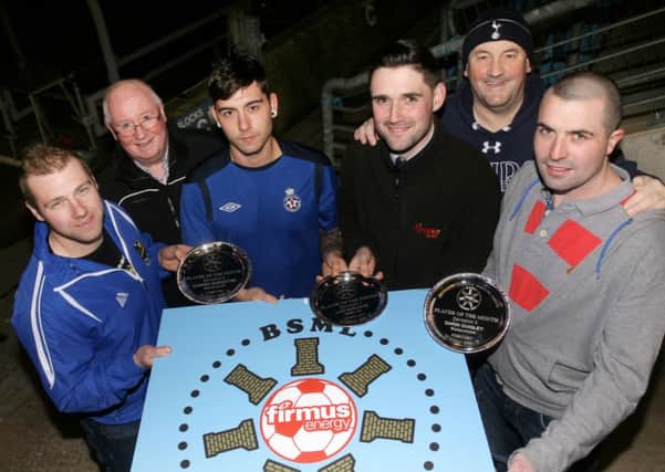 David Fusco of Firmus Energy presents the BMSL Division 1 player of the month award of Luis Marcote of Abbeyview. Looking on are Darren Burgoyne (Divison 2, Glenravel), Darin Quiqley (Division 3, Glenravel), Brian Montgomery (BMSL) and David King (BMSL). INBT11-228AC
