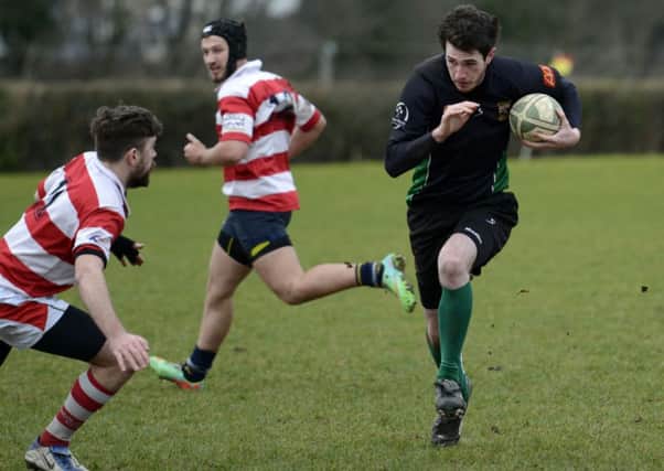 Jamie Devine makes an attacking run for City of Derry IIl's during Saturday's match against Randalstown Seconds. INLS1015-118KM