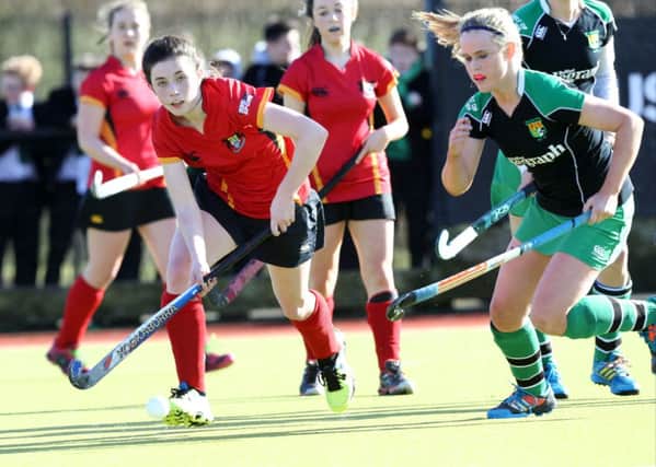 Orla Thompson drives forward for the Academy who came up just short in the Schools Cup decider. Pics: Rowland White / Presseye.