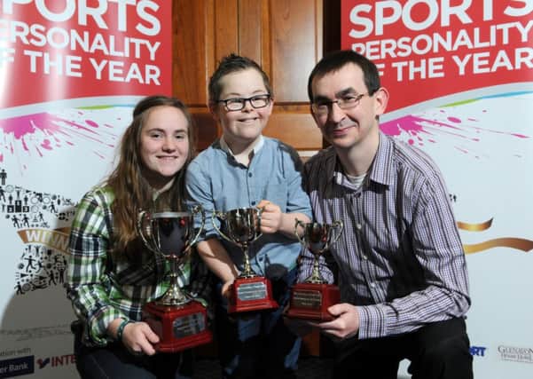 Mid-Ulster Mail and Tyrone Times 2014 Sports Personality of the Year Samantha Kelly with runner-up Tiernan McShane and Third place-winner Patrick Wallace.INTT1015-427