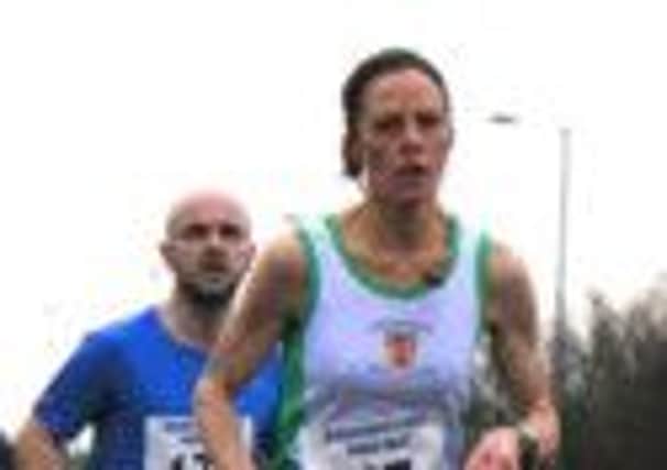 County Antrim Harriers' Helen Collins (77) on her way to a PB at the Albertville 5-mile road race. INLT 11-927-CON