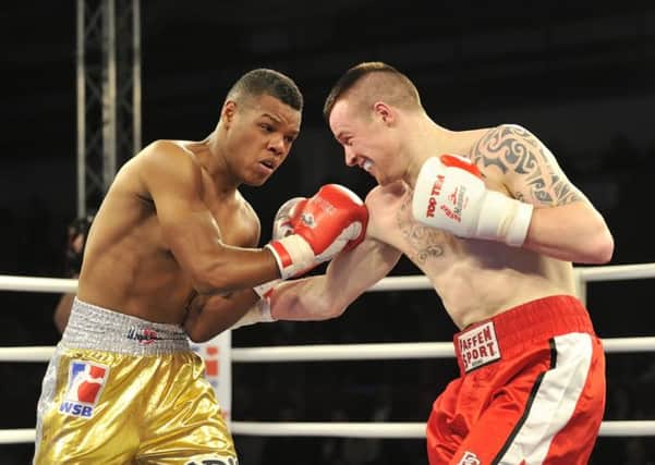 Steven Donnelly in action during his most recent World Series Boxing victory, over Puerto Rico's Nicklaus Flaz.
