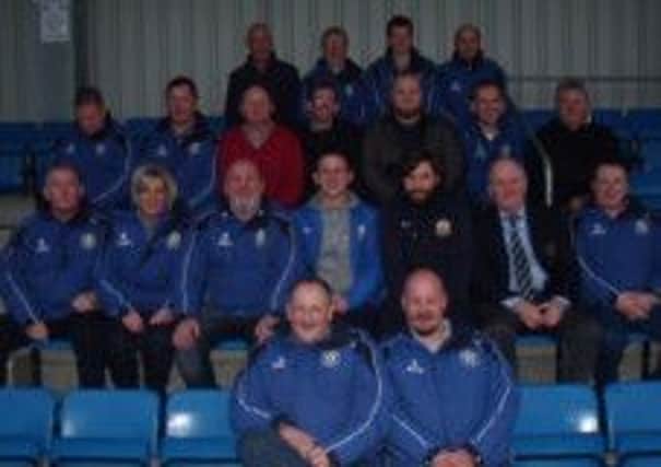 Cookstown Yoth FC coaches enjoyed a day out to Ballinamallard Utd v Glenavon last weekend and are pictured with the respective managers Whitey Anderson and Gary Hamilton