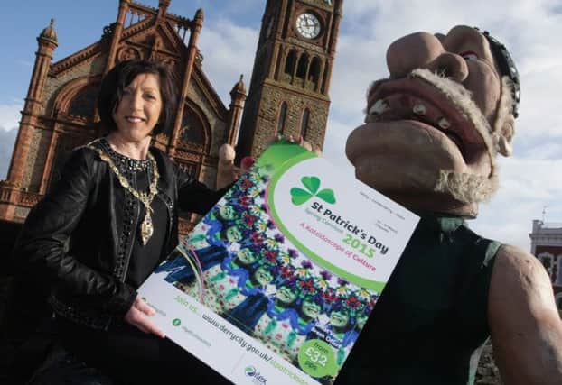 ST. PADDY'S DAY LAUNCH!. . . .The Mayor of Derry, Councillor Brenda Stevenson launching the St. Patrick's Day Spring Carnival 2015 on Derry's Walls yesterday afternoon. This year's event will run from 14-17 March citywide. DER0715MC002 (Photo: Jim McCafferty)
