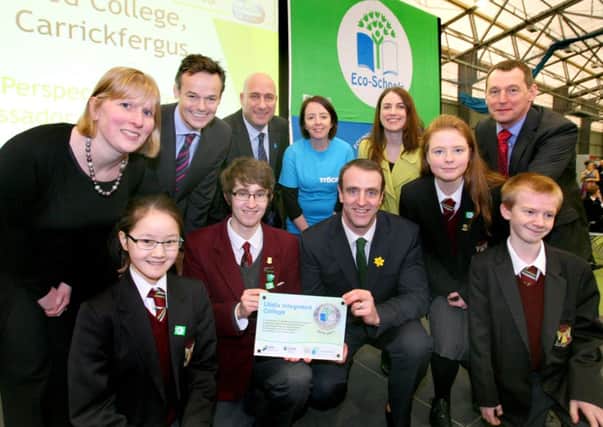 Pictured with pupils and staff from Ulidia Integrated College, who were receiving an award for Global Perspectives Ambassador School, are Tony Wilcox, chair of Keep Northern Ireland Beautiful; Daniel Schaffer, Foundation for Environmental Education; Rosie Murray from Trocaire; Orla Devine from Global Learning Programme; Ian Humphreys, CEO, Keep Northern Ireland Beautiful and Minister for the Environment Mark H Durkan.  INCT 11-721-CON