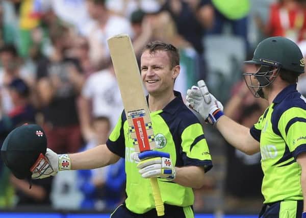 Ireland captain William Porterfield celebrates after scoring hundred runs during their World Cup match against Pakistan in Adelaide. Picture by James Elsby