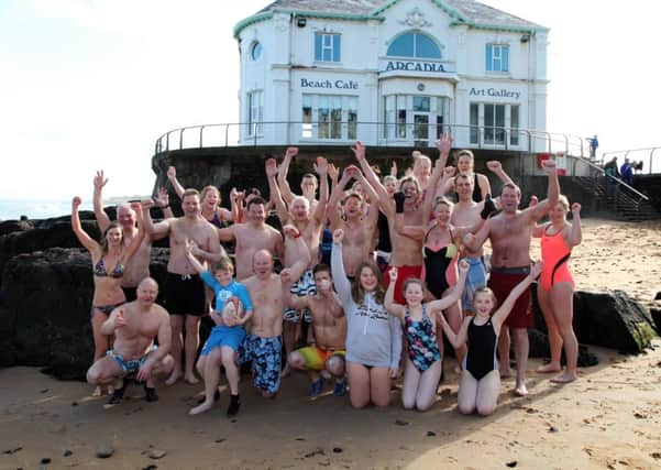 Some of the swimmers pictured before their dip into the sea at the Arcadia Portrush on Sunday morning. INCR11-374PL