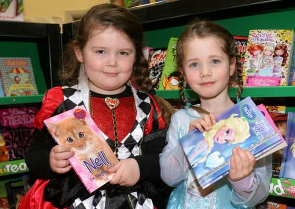 Camphill PS pupils Cara McCleery and Lucy Pitman dressed up for World Book Day. INBT11-212AC