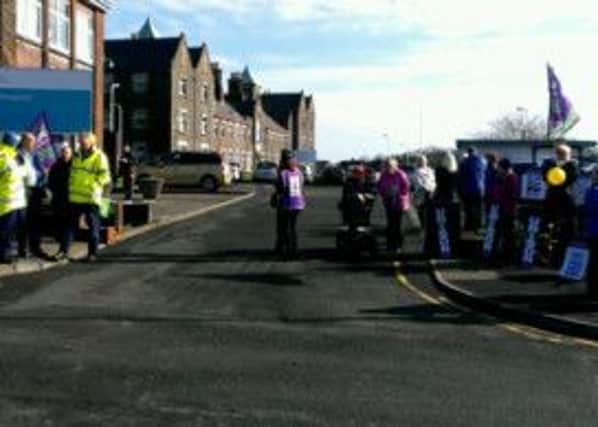 Healthcare workers take part in the public sector strike at the Moyle Hospital. INLT-11-704-con