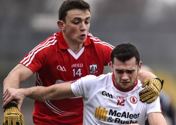 ©Russell Pritchard  15th March 2015
Allianz FL Division 1 Round 5 : Tyrone vs Cork Healy Park, Omagh, Co.Tyrone. 
Corks Mark Collins v Tyrones Ryan McKenna in action at Sundays Game.
©Russell Pritchard / Presseye