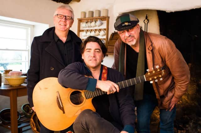 Singer Brian Kennedy (seated) with Colin Magee, United Airlines Belfast Nashville Songwriters Festival, and John Walker, producer of Music City Roots, during filming for the TV show at the Andrew Jackson Homestead in Carrickfergus. (Photo by Phil Smyth). INCT 11-790-CON