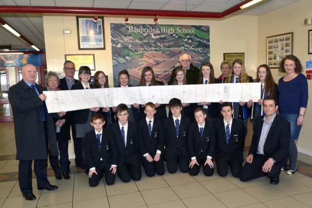 Banbridge High School pupils holding the Crozier Family Tree are pictured with Marine Archeologist who discovered the Erebus, Ryan Harris and Crozier Family members  Martin Crozier, Rawdon Crozier, Lorna Crozier and Sandra Ardis, included is Heritage Officer Jason Diamond and History Teacher Emma Englefield ©Edward Byrne Photography INBL1511-205EB