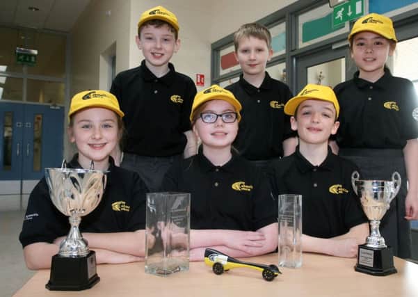 St. Colmcille's PS pupils Mark McCormick, Jack Hamill, Sian Zensque, Orla McAtamney, Sophie Agnew and Richard McCann, who won a discretionary award and were placed 2nd overall UK finals of the Formula 1 in Schools competition. INBT13-211AC