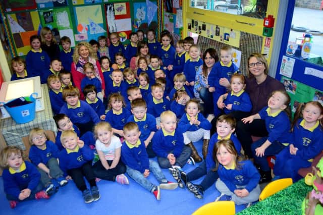 Mossley Nursery School staff and pupils were delighted with their 'outstanding' inspection report. INNT 12-009-GR