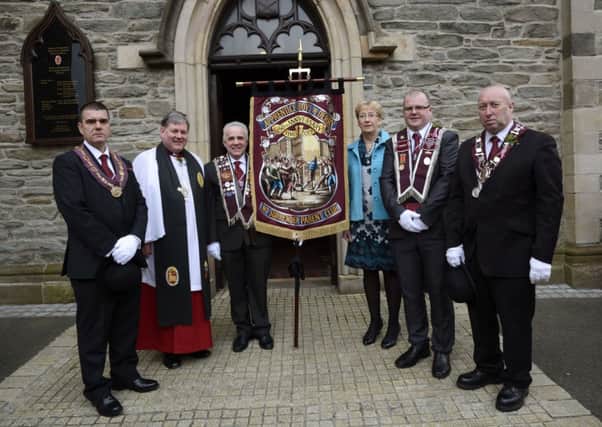 Pictured with the new bannerette which was dedicated by Dean William Morton, second from left, in St. Columbs Cathedral yesterday for the No Surrender Parent Club were, from left, Graeme Stenhouse, Lieutenant Governor of the General Committee of the Apprentice Boys of Derry, Johnston Young, standard bearer for the No Surrender Parent Club, Councillor Hilary McClintock, who unfurled the bannerette, Jonathan Acheson, President of the No Surrender Parent Club, and Jim Brownlee, Governor of the General Committee. INLS1115-189KM