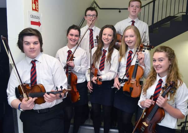 Ready to do their bit at the Ballymena Academy annual concert in the Ballymena Braid Arts Centre were these musical pupils. INBT 13-802H