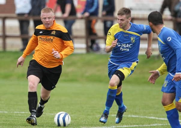 Barn United's Wayne Patterson, seen here in action against Wellington Rec, scored in Saturday's victory over UUJ.