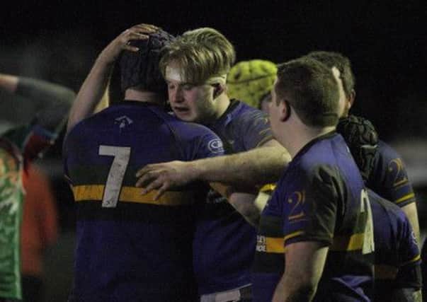 Lisburn players celebrate their win against UUC, at Lisburn Rugby Club. US1511-524cd  Picture: Cliff Donaldson