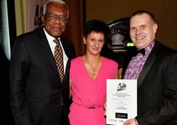 Paul Byrne being presented his award at the awards ceremony which was hosted by Depaul president and broadcasting legend Sir Trevor McDonald OBE.