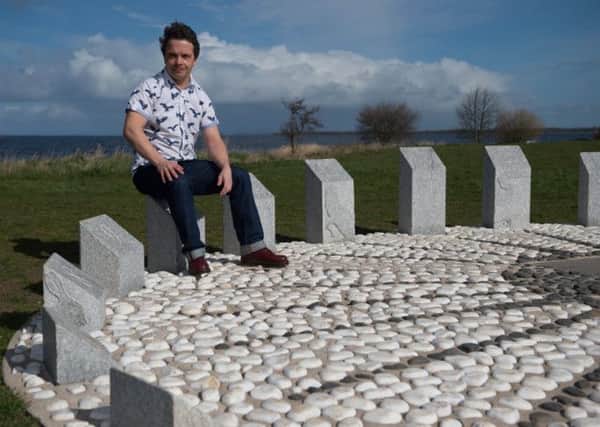Local artist Jonny Kerr pictured at his recently opened creation, a human sun dial on the shores of Lough Neagh at Oxford Island. INLM1315-401
