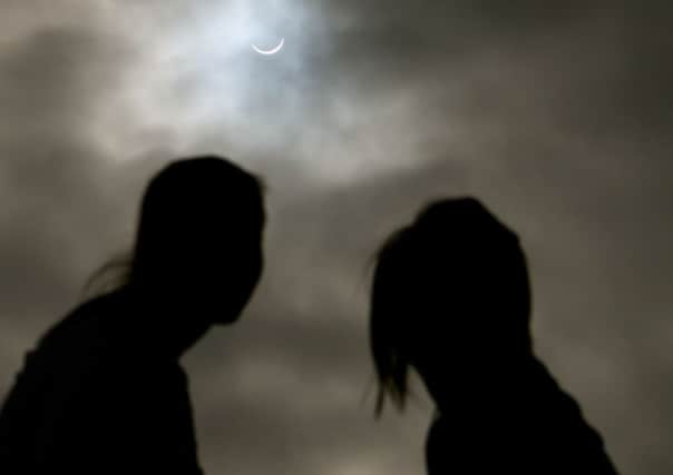 Claire and Katie Steele from Waringstown  look at the eclipse