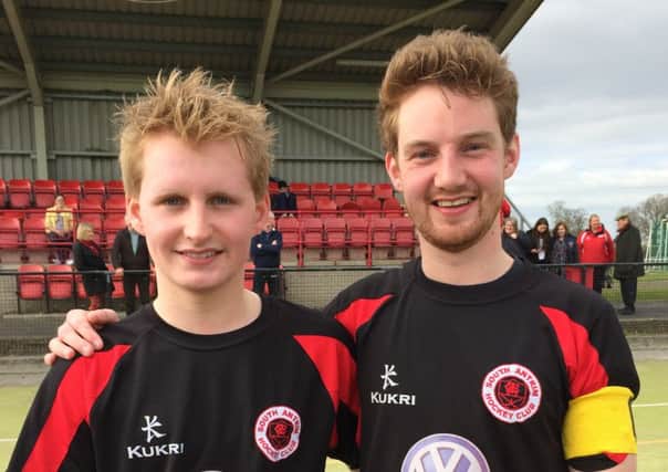 Brothers Adam and Lee Marshall, the South Antrim 1st XI Captain, celebrate winning the league and gaining promotion to the Premier League.