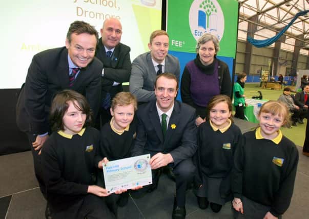 Pictured with staff and pupils from Fair Hill Primary School who were receiving an award for Energy Ambassador School are Tony Wilcox Chair of Keep Northern Ireland Beautiful, Josh Bradley SSE Airtricity, Daniel Schaffer, Foundation for Environmental Education and Minister for the Environment Mark H Durkan