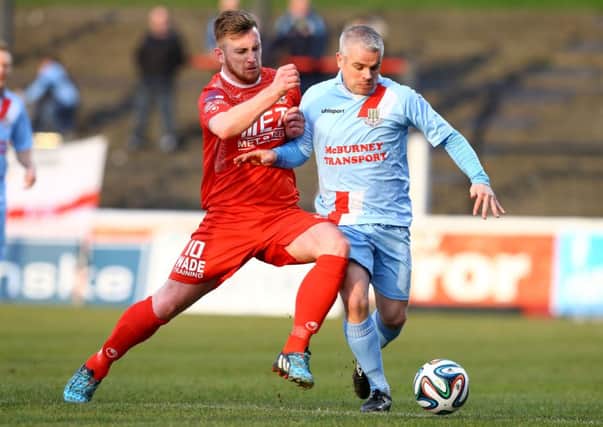 Ballymena United's Gary McCutcheon with Portadown's Mark McAllister during Saturday evening's Irish Cup Semi Final at the Oval. Picture: Press Eye.