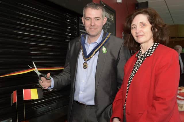 Banbridge District Council Vice Chairman Cllr Councillor Pól O'Gribin cut the ribbon to officially open the new kitchen suite at Banbridge Hockey Club, included is Club President Sheree Totton ©Edward Byrne Photography INBL1512-261EB