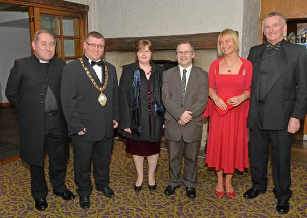 Attending the 75th anniversary event of Larne Borough Council are (from left) Rev Dr John Nelson, Mayor of Larne Martin Wilson, Sandra Hume, Dr David Hume and Olivia and John Armstrong. INLT 12-018-PSB